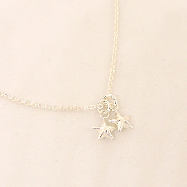 tiny silver stars necklace
